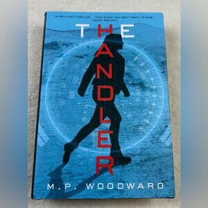The Handler by M.P. Woodward Hardcover Novel Military Espionage Suspense
